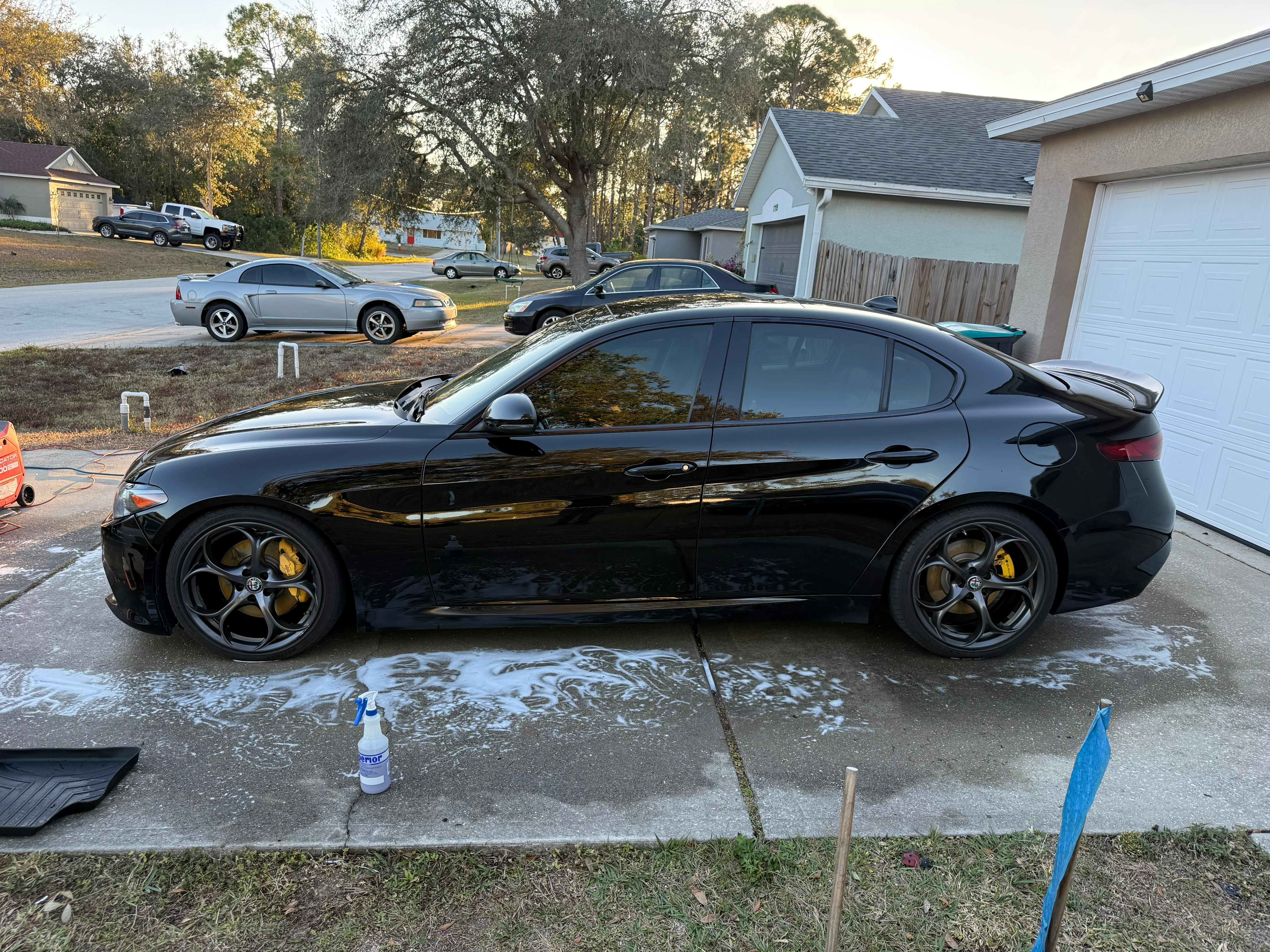 Black Alfa Romeo sports car premium exterior detail