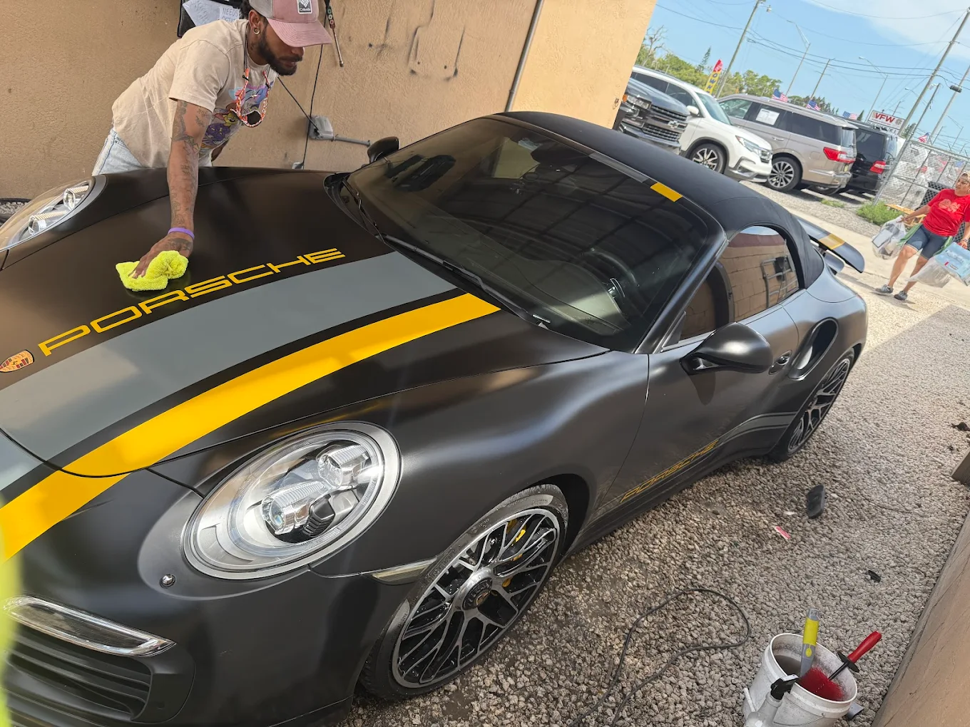 Professional detailing Porsche with racing stripes