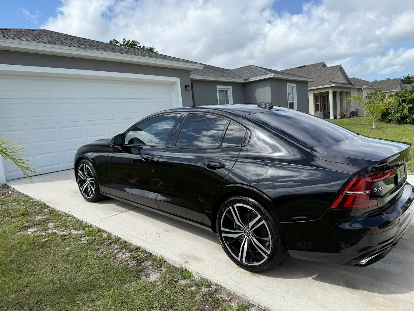 Black Volvo sedan exterior detail