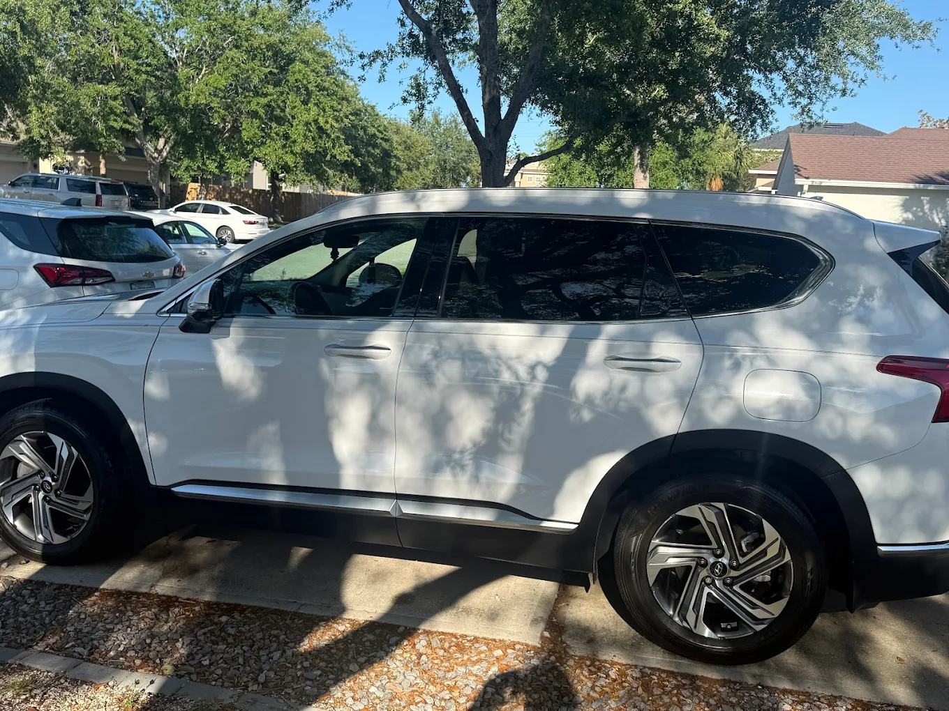 White Hyundai SUV side profile